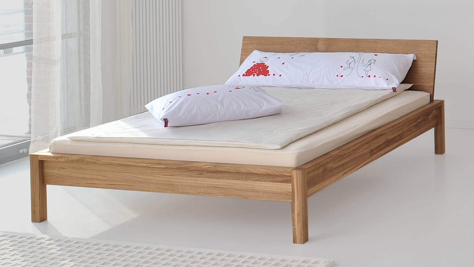 Massivholzbett Cara Eiche Buche Kirsche Nussbaum